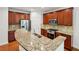 Well-appointed kitchen with stainless steel appliances, granite countertops, and ample cabinet space at 1648 Danbury Parc Ne Pl, Brookhaven, GA 30319