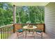 Serene outdoor deck with wooded views, offering a relaxing space for outdoor seating and enjoyment at 1648 Danbury Parc Ne Pl, Brookhaven, GA 30319