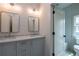 Bathroom with double vanity, modern fixtures, and stylish design at 2164 James Aly, Atlanta, GA 30345