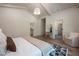 Neutral primary bedroom with hardwood floors, recessed lighting, and ensuite access at 2164 James Aly, Atlanta, GA 30345