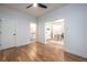 Bedroom featuring hardwood floors, doorway access to an ensuite bathroom and an adjoining office at 2164 James Aly, Atlanta, GA 30345