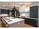 Spacious kitchen with a large island, stainless steel appliances, and custom cabinetry at 2164 James Aly, Atlanta, GA 30345