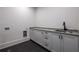 Laundry room with granite countertop and tile floor at 2164 James Aly, Atlanta, GA 30345