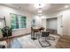 Home office with hardwood floors, a modern desk, and a view of the backyard at 2164 James Aly, Atlanta, GA 30345