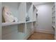 Large walk-in closet with custom shelving and hardwood floors at 2164 James Aly, Atlanta, GA 30345