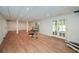 Open finished basement with recessed lights, wood-look flooring, and access to the backyard at 805 Wesley Oak Rd, Atlanta, GA 30328