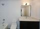 Modern bathroom with white subway tiles, sleek vanity, and updated fixtures at 805 Wesley Oak Rd, Atlanta, GA 30328