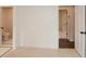 This bedroom features hardwood floors and doorways to multiple rooms at 805 Wesley Oak Rd, Atlanta, GA 30328