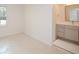 This bedroom features windows to the outside and a doorway to the bathroom at 805 Wesley Oak Rd, Atlanta, GA 30328