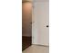 White six-panel door in a hallway with neutral wall paint at 805 Wesley Oak Rd, Atlanta, GA 30328
