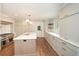 Bright kitchen features a large island, stainless steel appliances, and ample cabinet space at 805 Wesley Oak Rd, Atlanta, GA 30328