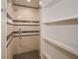 Modern bathroom with glass shower door, patterned tile, and built in shelving at 805 Wesley Oak Rd, Atlanta, GA 30328
