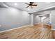 Open bonus room with laminate flooring, open floor plan, and easy access to the rest of the house at 1235 Renaissance Se Ct, Mableton, GA 30126