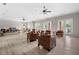 Inviting common area with comfortable seating and plenty of natural light, perfect for socializing and relaxing at 1235 Renaissance Se Ct, Mableton, GA 30126