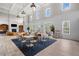 Bright common area with ample seating, stylish decor, and access to outdoor spaces, perfect for community gatherings at 1235 Renaissance Se Ct, Mableton, GA 30126