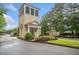 Well-maintained guard house with beautiful landscaping, enhancing the community's security and curb appeal at 1235 Renaissance Se Ct, Mableton, GA 30126