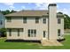 Rear exterior view of home showcasing the siding, windows, and yard space, perfect for outdoor activities at 3559 Reservoir Pass, Acworth, GA 30101