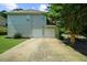 Spacious two-car garage with a long driveway, providing ample parking and convenient access to the home at 3559 Reservoir Pass, Acworth, GA 30101