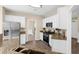 Well-equipped kitchen with white cabinets, granite countertops, and stainless steel appliances at 3559 Reservoir Pass, Acworth, GA 30101
