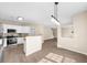 Open concept kitchen with stainless steel appliances, granite countertops, and wood flooring at 3559 Reservoir Pass, Acworth, GA 30101