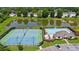 Enjoy community amenities like tennis courts, a pool, and a clubhouse set by a pond for recreation and relaxation at 3559 Reservoir Pass, Acworth, GA 30101
