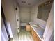 A compact bathroom with a sink, toilet, and shower/tub combo at 5035 Chadwick Ct, Decatur, GA 30035