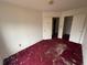An interior bedroom with a closet and doorway at 5035 Chadwick Ct, Decatur, GA 30035