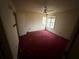 A bedroom with a ceiling fan and a window at 5035 Chadwick Ct, Decatur, GA 30035