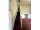 View of a staircase leading to the second floor with a ceiling fan at 5035 Chadwick Ct, Decatur, GA 30035