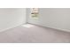Spacious bedroom with neutral carpet and a window at 504 Oak View Ln, Dallas, GA 30157