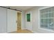 Finished basement featuring luxury vinyl plank flooring, access to backyard at 5930 Shannon Drive Dr, Cumming, GA 30040