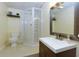 Bright bathroom with a glass-enclosed shower, vanity, and modern fixtures at 5930 Shannon Drive Dr, Cumming, GA 30040