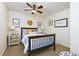 Tastefully decorated bedroom with a ceiling fan, modern accents, and stylish décor at 5930 Shannon Drive Dr, Cumming, GA 30040