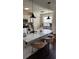 Updated kitchen features a granite island with bar seating, and stainless appliances at 5930 Shannon Drive Dr, Cumming, GA 30040