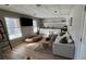 Cozy finished basement with ample seating, bar area, and modern furnishings at 5930 Shannon Drive Dr, Cumming, GA 30040