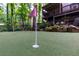 Backyard putting green beside the house at 5930 Shannon Drive Dr, Cumming, GA 30040