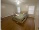 A standard bedroom features light from the windows at 8955 Stonebridge Blvd, Douglasville, GA 30134