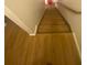 Hardwood stairs with railing lead to the upper level of this lovely home at 8955 Stonebridge Blvd, Douglasville, GA 30134