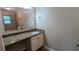 This bathroom features a large vanity and a tub/shower combo at 1127 Renee Dr, Decatur, GA 30035