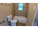 This bathroom features a tub/shower combo at 1127 Renee Dr, Decatur, GA 30035