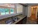 Kitchen sink with a view of the backyard and stainless steel appliances at 1127 Renee Dr, Decatur, GA 30035