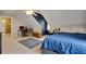 Bedroom featuring a ceiling fan, a sloped accent wall, and a desk at 1685 Frazier Park Dr, Decatur, GA 30033