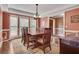 Formal dining room with large windows, chair rail, and ample space for entertaining at 1685 Frazier Park Dr, Decatur, GA 30033