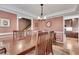 Formal dining room features hardwood floors, decorative chair rail, and easy access to kitchen at 1685 Frazier Park Dr, Decatur, GA 30033