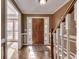 Light-filled foyer showcases hardwood floors, crown molding, and a view into the living spaces at 1685 Frazier Park Dr, Decatur, GA 30033