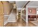 Foyer features hardwood floors, stairway, and access to the dining room and living areas at 1685 Frazier Park Dr, Decatur, GA 30033