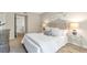 Well-lit bedroom with bed and view to hallway at 17 Ivy Gates Ne, Atlanta, GA 30342