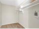 Small closet space with basic shelving and carpet flooring at 17 Ivy Gates Ne, Atlanta, GA 30342