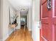 Inviting entryway with hardwood floors, stylish console table, and neutral wall color at 17 Ivy Gates Ne, Atlanta, GA 30342