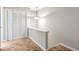 Hallway landing featuring closet and light fixture at 17 Ivy Gates Ne, Atlanta, GA 30342